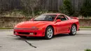 Mitsubishi 3000 GT: Rival dari Nissan Skyline GTR R34, Toyota Supra MK4, Honda NSX, dan RX-7 FD ini memiliki teknologi dan tenaga diatas lawan-lawannya tersebut. Baik desain, tenaga, teknologi, hingga keasyikan berkendara 3000 GT tidak kalah dengan saingan di kelasnya. Mesinnya menggunakan konfigurasi V6 berkapasitas 3.000cc twin-turbo yang mampu mengeluarkan tenaga hingga 320 Hp. (Source: pcarmarket.com)