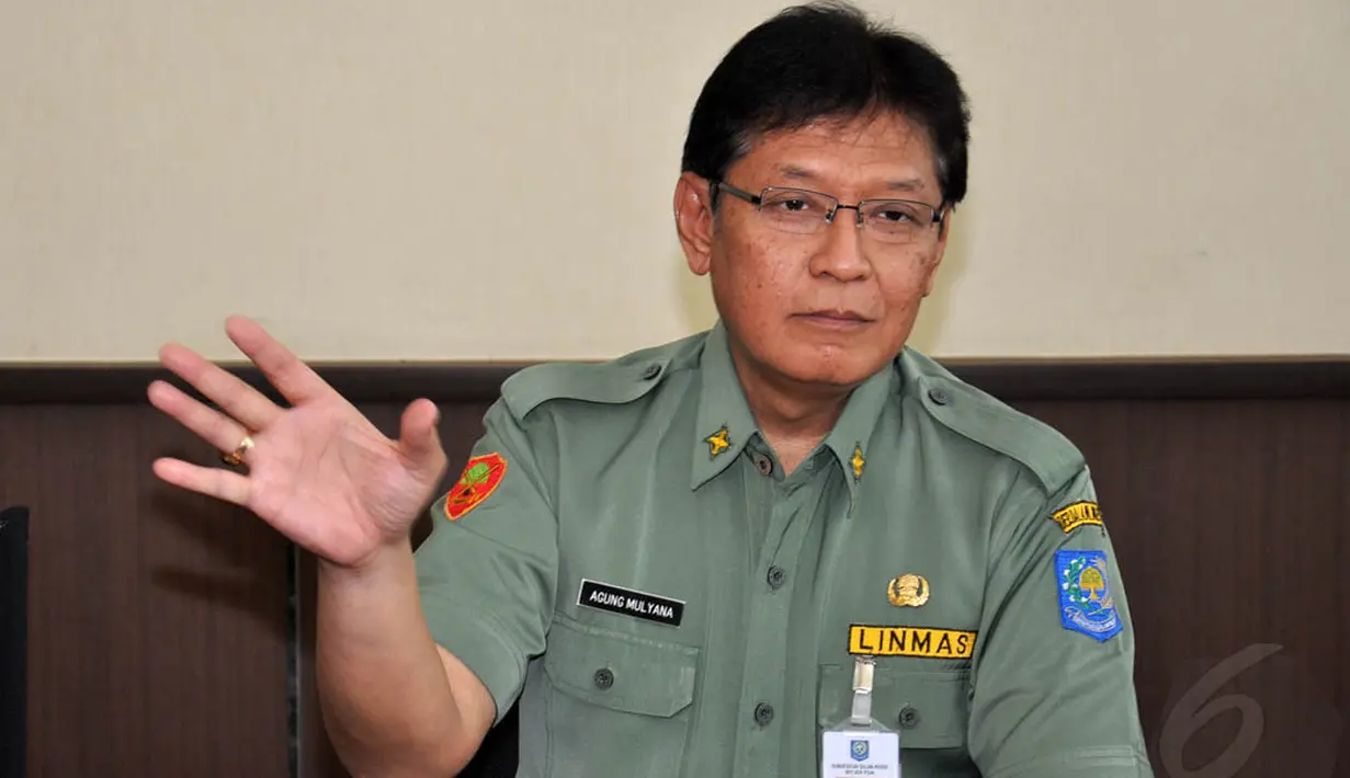 Dirjen Pemerintahan Umum Kemendagri Agung Mulyana mengatakan atas dasar pencabutan keppres itu, maka hansip bukan dibubarkan, hanya dilakukan penggantian landasan hukumnya saja, (22/9/14). (Liputan6.com/Miftahul Hayat)