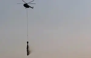 BNPB Kerahkan Dua Water Bombing ke TPA Jatiwaringin