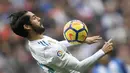 Pemain lincah Real Madrid, Isco menempati peringkat ketiga dengan koleksi lima gol pada daftar top scorer Madrid. (AFP/Gabriel Bouys)