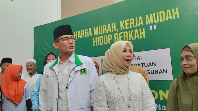 Ketua Bappilu PPP Sandiaga Uno bersama istrinya Nur Asia