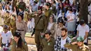 Israel telah enam kali berperang dengan negara-negara Arab tetangganya, memerangi dua pemberontakan Palestina dan mengalami sejumlah serangan militan yang mematikan sejak didirikan pada tahun 1948. (AFP/MENAHEM KAHANA)