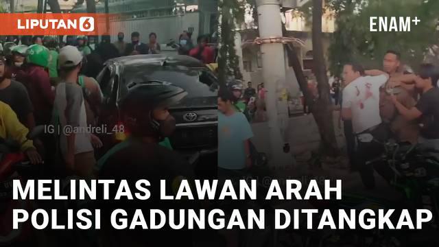 Aksi seorang oknum polisi gadungan melintas lawan arah hingga tabrak belasan kendaraan viral di media sosial