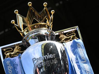 Sebagai salah satu liga terbaik di dunia dengan persaingan yang ketat antar sesama klub di dalamnya, raihan gelar Liga Inggris tentu menjadi kebanggaan setiap pemain yng berkompetisi membela klubnya. Namun 5 pemain berikut agaknya bernasib sial, karena saat klubnya menjuarai Liga Inggris, mereka nyatanya sedang dipinjamkan ke klub lain sehingga tidak berhak atas raihan gelar tersebut. Berikut daftar kelima pemain tersebut. (AFP/Justin Tallis)