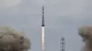 Roket Proton - M membawa pesawat luar angkasa ExoMars 2016 saat meluncur menuju planet Mars di Kazakhstan , (14/3). Keterlibatan Rusia di ExoMars datang menyusul pengunduran diri NASA dari misi ini. (REUTERS / Shamil Zhumatov)
