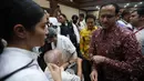 Mantan Menteri Pendidikan, Kebudayaan, Riset, dan Teknologi (Mendikbudristek), Nadiem Anwar Makarim (kanan), usai sidang pembacaan tuntutan di Pengadilan Tindak Pidana Korupsi Jakarta, Rabu 13 Mei 2026. (Kapanlagi.com/Budy Santoso)