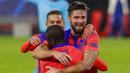 Striker Chelsea, Olivier Giroud, melakukan selebrasi usai mencetak gol ke gawang Sevilla pada laga Liga Champions di Stadion Ramon Sanchez Pijuan, Kamis (3/12/2020). Chelsea Menang dengan skor 4-0. (AP/Angel Fernandez)