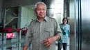 Hakim PN Jakarta Selatan, Djoko Indiarto bersiap menjalani pemeriksaan di Gedung KPK, Jakarta, Jumat (8/9). Djoko akan diperiksa sebagai saksi kasus suap yang melibatkan Tarmizi, panitera pengganti di PN JakSel. (Liputan6.com/Helmi Afandi)