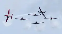 Jupiter Aerobatic Team (JAT) TNI AU menerbangkan pesawat KT-1 saat tampil pada pratinjau Singapore Airshow 2022 di Singapura, Minggu (13/2/2022). Singapore Airshow 2022 akan berlangsung pada 15-18 Februari 2022. (Roslan RAHMAN/AFP)