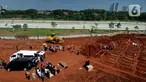 Suasana lahan baru Tempat Pemakaman Umum (TPU) khusus COVID-19, Jombang, Tangerang Selatan, Banten,Senin (26/7/2021). Pemkot Tangerang Selatan membuka lahan baru TPU khusus COVID-19 yang dapat menampung 800 makam. (merdeka.com/Arie Basuki)