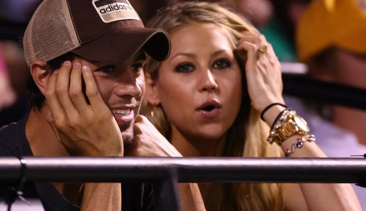 Lucunya, Enrique sendiri tak pernah bertemu dengan Anna sebelumnya. Namun, dirinya mengaku penggemar berat petenis tersebut. (CLIVE BRUNSKILL  GETTY IMAGES NORTH AMERICA  AFP)
