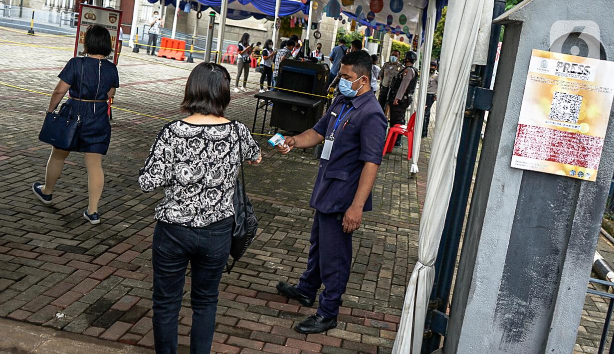FOTO: Polisi Bersenjata Jaga Puncak Ibadah Paskah di ...