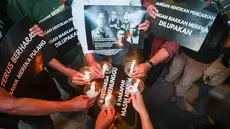 Sejumlah anggota Pewarta Foto Indonesia (PFI) Jakarta mengikuti doa bersama untuk lima jurnalis dan tiga awak kapal yang hilang kontak di perairan Selat Sunda, Jumat (11/9/2026). (Istimewa)
