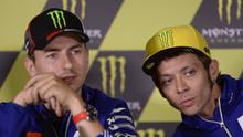 Jorge Lorenzo dan Valentino Rossi, sama-sama akan menghadapi tantangan yang berat di sirkuit Red Bull Ring, Austria. (JOSEP LAGO / AFP)