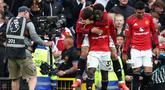 Manchester United berhasil meraih kemenangan penting saat menjamu Liverpool di Stadion Old Trafford, Minggu (3/5/2026) malam WIB. Kejar mengejar gol terjadi, namun gol Kobbie Mainoo memastikan tiga poin krusial buat Setan Merah. (AFP/Darren Staples)