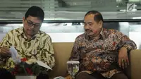 Kepala PPATK Kiagus Ahmad Badaruddin (kanan) saat menghadiri jumpa pers usai pertemuan di Jakarta, Selasa (29/8). Pertemuan beragendakan dua hal penting diantaranya penyampaian progres report atas pelaksanaan MER. (Liputan6.com/Helmi Fithriansyah)  
