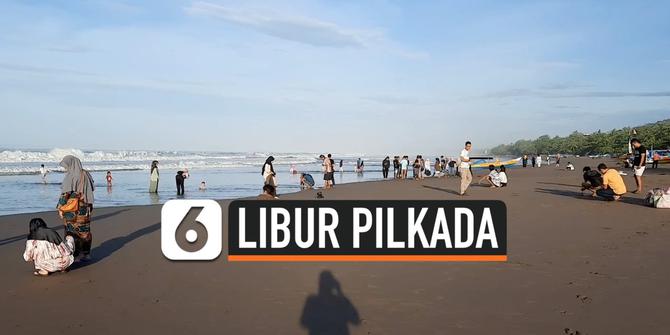VIDEO: Libur Nasional Pilkada, Masyarakat Berlibur ke Pantai