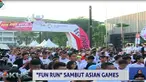 Suasana Fun Run 2018 terlihat menggelorakan semangat Asian Games yang digelar di Gelora Bung Karno, Jakarta pada Minggu pagi.