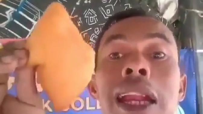 Tangkapan layar video viral Odading Mang Oleh. (dok. Instagram @odadingmangoleh/ https://www.instagram.com/p/CE8DZFqjblx/?igshid=12dvly9si0mkj/Brigitta Bellion).