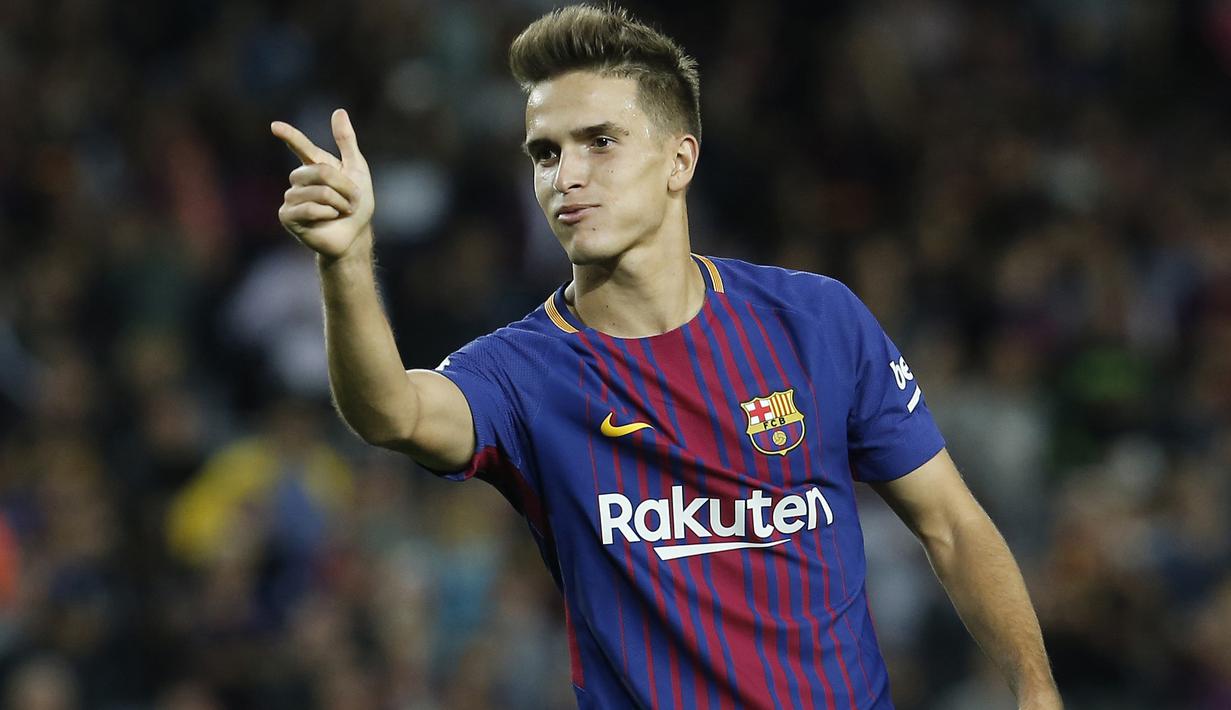 Pemain Barcelona, Denis Suarez merayakan golnya ke gawang Eibar pada lanjutan La Liga Spanyol di Camp Nou stadium, Barcelona (19/9/2017). Barcelona menang 6-1. (AFP/Pau Barrena)