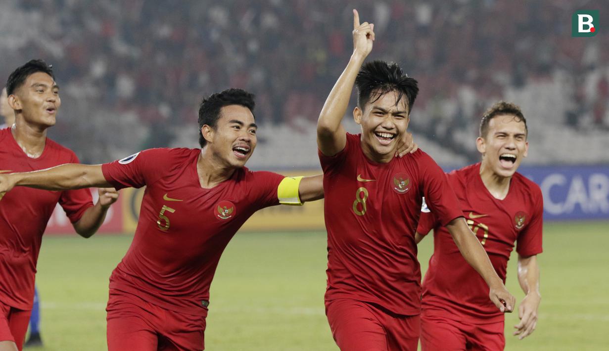 Gelandang Indonesia, Witan Sulaeman, melakukan selebrasi usai membobol gawang Chinese Taipei, pada laga AFC U-19 di SUGBK, Jakarta, Kamis (18/10/2018. Indonesia menang 3-1 atas Chinese Taipei. (Bola.com/M Iqbal Ichsan)
