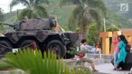 Monumen Nani Wartabone di nol kilometer Kota Gorontalo kini jadi tempat favorit bagi warga untuk ngabuburit. Adanya Alutsista TNI AD menambah keindahan sekitar monumen untuk dijadikan latar belakang berswafoto atau sekadar menghabiskan waktu menjelang buka puasa. (Liputan6.com/Arfandi Ibrahim)