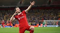 Pemain Liverpool, Diogo Jota melakukan selebrasi setelah mencetak gol kedua timnya ke gawang Union Saint-Gilloise pada laga Grup E Liga Europa 2023/2024 yang berlangsung di Anfield, Inggris, Jumat (6/10/2023) dini hari WIB. Liverpool menang dengan skor 2-0. (AFP/Oli Scarff)