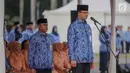 Gubernur DKI Jakarta Anies Baswedan saat mengikuti upacara peringatan Hari Lahir Pancasila di Monas, Jakarta, Sabtu (1/6/2019). Selain Aparatur Sipil Negara (ASN), upacara ini juga diikuti oleh perwakilan organisasi masyarakat. (Liputan6.com/Faizal Fanani)