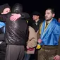 Tahanan Ukraina yang dibebaskan Rusia. Kedua negara bertukar ratusan tawanan perang, yang digambarkan oleh pihak berwenang di Kyiv sebagai pertukaran terbesar saat perang. (COORDINATION HQ FOR POWS)