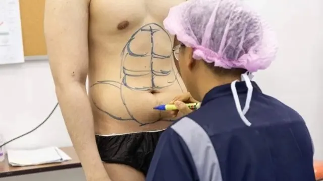 operasi six pack di Thailand