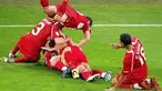 Turkish players celebrate after forward Nihat Kahveci (on the ground) scored during the Euro 2008 final group A match Turkey vs. the Czech Republic on June 15, 2008 at the Stade de Geneve, in Geneva. Turkey won the match 3-2. AFP PHOTO / FABRICE COFFRINI
