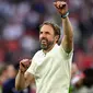 Pelatih Inggris, Gareth Southgate merayakan kemenangan atas Swiss pada laga perempat final Euro 2024 di Duesseldorf Arena, Duesseldorf, Jerman, Sabtu (06/07/2024). (AFP/Ina Fassbender)