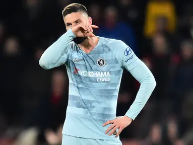 Ekspresi Olivier Giroud pada laga lanjutan Premier League yang berlangsung di stadion Dean Court, Bournemouth, Kamis (31/1). Chelsea dipermalukan 0-4 kontra Bournemouth. (AFP/Glyn Kirk)
