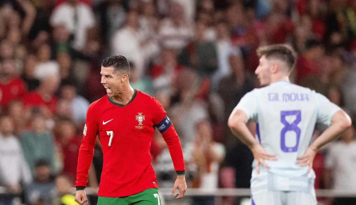 Cristiano sukses menjadi pahlawan Portugal saat menumbangkan Skotlandia dalam laga UEFA Nations League 2024/2025 yang digelar di Estadio da Luz, Lisbon pada Senin (9/9/2024) dimi hari WIB. (AFP/Patricia De Melo Moreira)