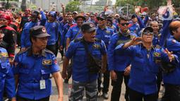 Aksi yang diikuti ratusan buruh ini untuk menolak regulasi pengupahan yang bertentangan dengan keputusan Mahkamah Konstitusi no. 168/PUUXXI/2023. (Liputan6.com/Herman Zakharia)