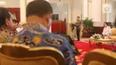 Presiden Joko Widodo bersama Ketua Dewan Pengarah BPIP Megawati Soekarnoputri saat Presidential Lecture Internalisasi dan Pembumian Pancasila di Istana Negara, Jakarta, Selasa (3/12/2019). Jokowi memberikan poin kunci untuk pembumian Pancasila di semua kalangan. (Liputan6.com/Angga Yuniar)