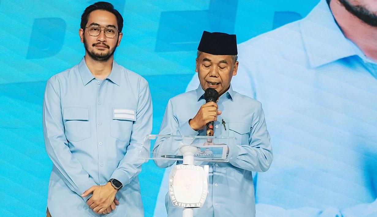 Jeje Ritchie Ismail atau Jeje Govinda berpasangan dengan Asep Ismail ada di nomor urut dua pilbup Bandung Barat. Di momen debat perdana, keduanya kompak memakai kemeja biru muda. Jeje juga ditemani oleh beberapa seleb termasuk keluarganya yang hadir, Syahnaz Sadiqah, Nisya Ahmad, Celine Evangelista, Tarra Budiman dan istri, Gya Sadiqah. (Liputan6.com/IG/@ritchieismail)