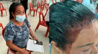 Aksi kocak wanita antre vaksin saat rambutnya masih dicat, jadi tontonan. (Sumber: World of Buzz)