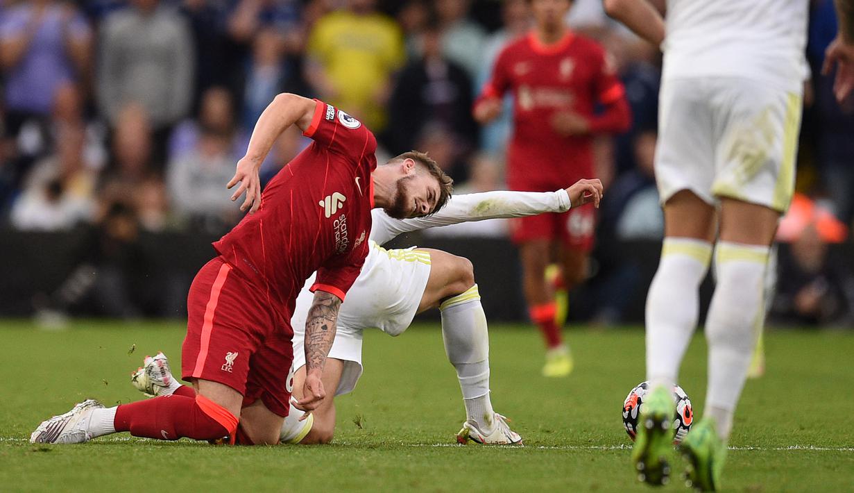 Elliot yang merupakan talenta muda potensial Liverpool itu bakal absen dalam jangka waktu lama dari Liga Inggris. (Foto:AFP/Oli Scarff)