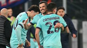 Bertanding di leg kedua 16 besar Liga Europa 2025/2026, Bologna unggul agregat 5-4 atas AS Roma. Tampak dalam foto, penyerang Bologna asal Italia, Nicolo Cambiaghi, merayakan golnya pada pertandingan leg kedua 16 besar Liga Europa 2025/2026 melawan AS Roma di Stadion Olimpico, Kamis (19/3/2026) waktu setempat atau Jumat 20 Maret 2026 dini hari WIB. (Alberto PIZZOLI/AFP)