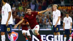 Pemain AS Roma, Alessandro Florenzi, merayakan golnya ke gawang Hellas Verona saat berlaga di Stadion Olimpiade, Roma (27/9/2014). (REUTERS/Tony Gentile)