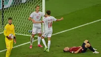 Selebrasi pemain Denmark, Kasper Dolberg usai menjebol gawang Republik Ceska dalam pertandingan perempat final Piala Eropa 2020 di Baku Olympic Stadium, Sabtu (3/7/2021). (Foto: AFP/Pool/Dan Mullan)