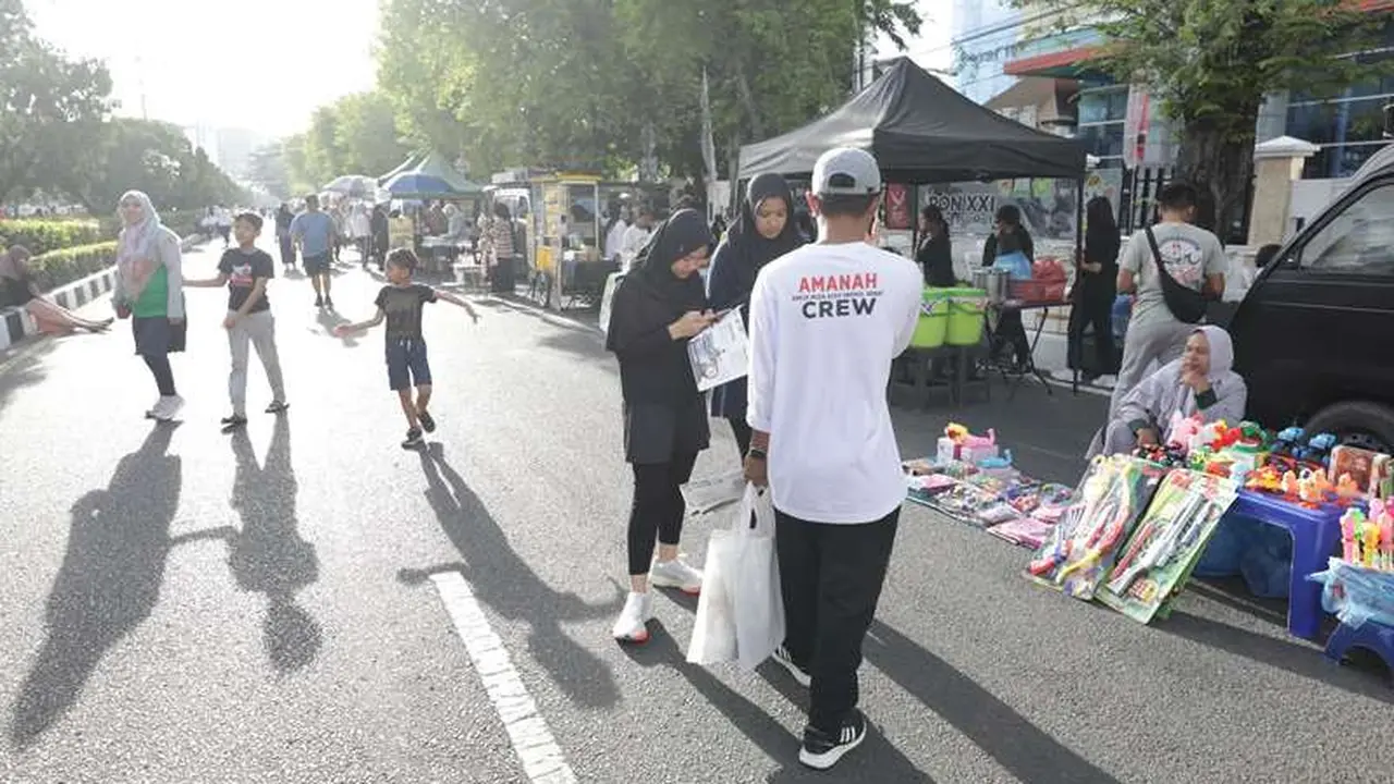 Aneuk Muda Aceh Unggul Hebat (AMANAH) melakukan olahraga serta mensosialisasikan program AMANAH pada saat Car Free Day (CFD) di Jl. Tgk. Moh. Daud Beureueh, Banda Aceh, Minggu (9/6) (Istimewa)