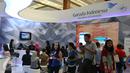Pengunjung mengantre di pameran Garuda Travel Fair (GATF) di JCC Senayan, Jakarta, Jumat (7/10). GATF  menawarkan tiket dan paket wisata dengan harga lebih rendah dari harga normal ke berbagai destinasi dalam dan luar negeri. (Liputan6.com/Angga Yuniar)
