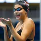 Yusra Mardini tertawa saat latihan jelang Olimpiade 2016 di Rio De Janeiro, Brasil (1/8). Yusra Mardini merupakan satu dari sepuluh atlet di seluruh dunia yang terpilih untuk mewakili Tim Pengungsi. (REUTERS/Michael Dalder)