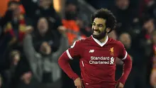 Mohamed Salah memborong dua gol saat Liverpool ditahan Tottenham Hotspur 2-2. (Paul ELLIS / AFP)