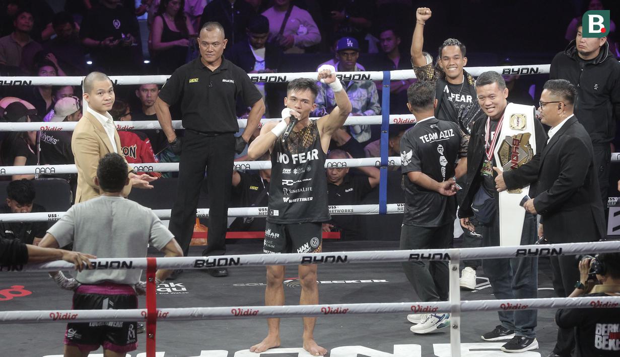 Aziz Calim menjadi juara nasional Kickstriking kelas 61 kg setelah menang angka mutlak atas KKajhe. (Bola.com/M Iqbal Ichsan)