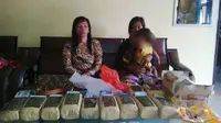 2 Ibu Rumah Tangga dari Aceh Dibekuk setelah kedapatan membawa 11 Kg ganja. (Liputan6.com/M Syukur)