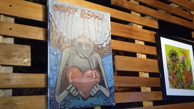 Pengunjung kafe di lokasi pameran Aceh Art Peace Camp (Liputan6.com/Rino Abonita)