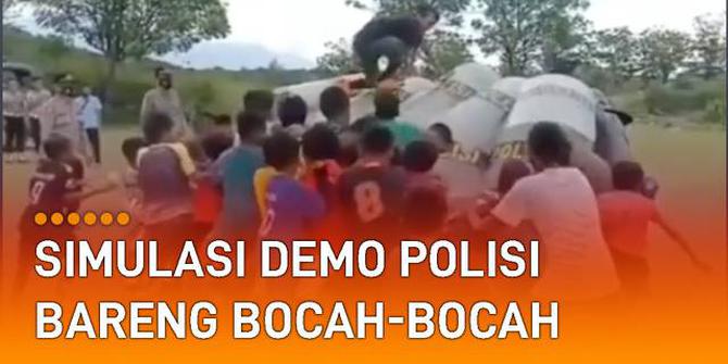 VIDEO: Bersama Bocah-Bocah, Polisi Lakukan Simulasi Demo di Lapangan